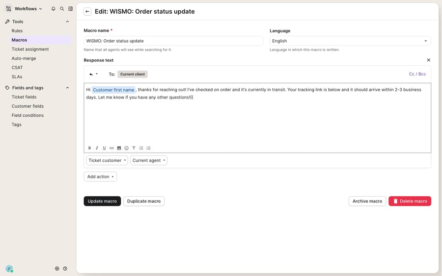 The Macro editor (Edit: WISMO: Order status update) with a 'Customer first name' variable chip embedded in the response text and the 'Ticket customer' and 'Current agent' variable-insertion dropdowns below the body — the {{variable}} insertion surface to check when macro variables render literally instead of resolving.