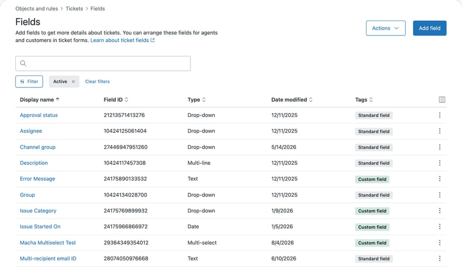 The Zendesk ticket fields list showing display name, field ID, type and a tag column marking each field as Standard field or Custom field