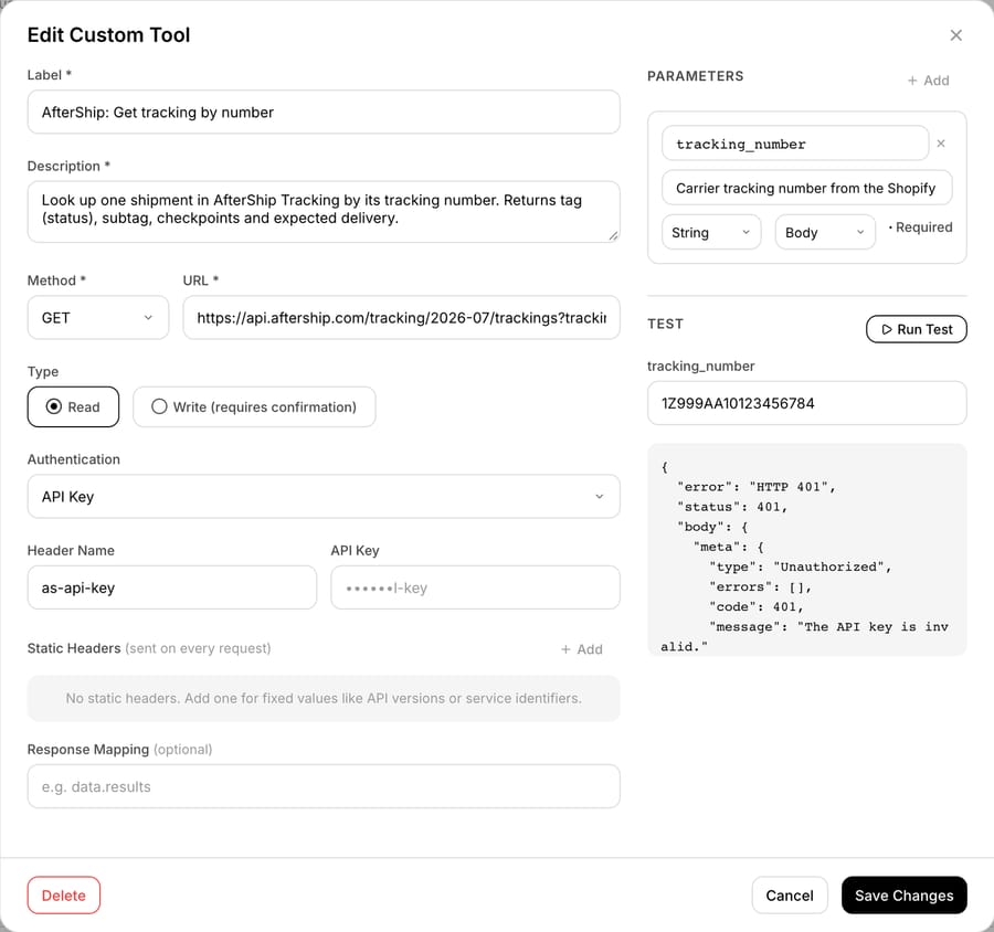 Macha custom tool 'AfterShip: Get tracking by number' on our test org: GET api.aftership.com/tracking/2026-07/trackings, API Key auth in the as-api-key header, and a Run Test returning HTTP 401 'The API key is invalid.'
