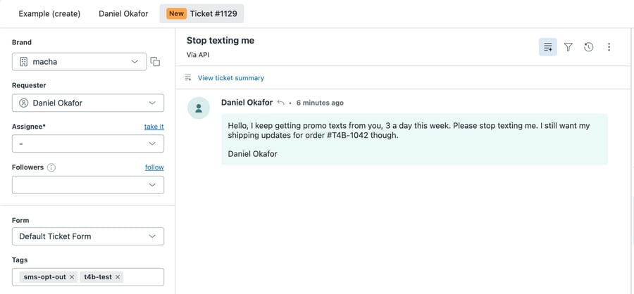 Zendesk sandbox ticket #1129, Stop texting me, via API from made-up requester Daniel Okafor asking to stop promo texts but keep shipping updates for order #T4B-1042, tagged sms-opt-out and t4b-test