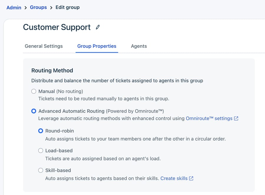 Freshdesk's Group Properties tab with the routing method choices: Manual, or Advanced Automatic Routing by round-robin, load-based or skill-based.